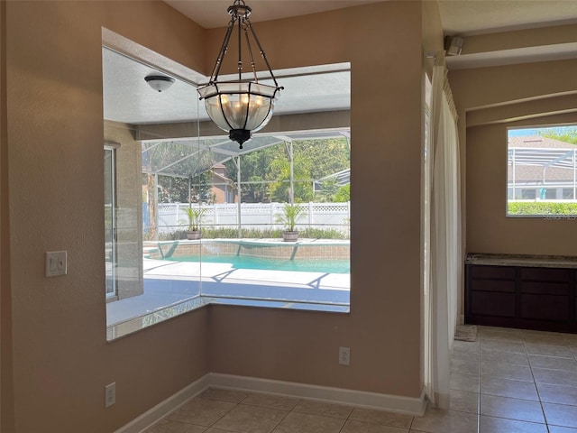 702 Palenci Ct, Winter Springs, FL 32708 - unfurnished dining area with baseboards and tile patterned flooring