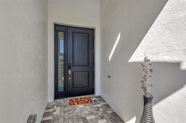 15865 Key Biscayne Ln, Loxahatchee, FL 33470 - property entrance with stucco siding