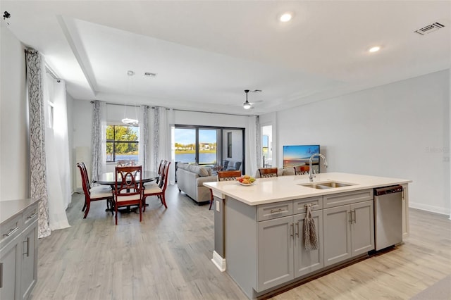 15865 Key Biscayne Ln, Loxahatchee, FL 33470 - kitchen with a sink, dishwasher, gray cabinets, light countertops, and open floor plan