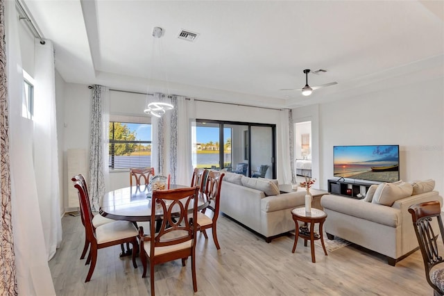 15865 Key Biscayne Ln, Loxahatchee, FL 33470 - dining room with light wood finished floors and ceiling fan