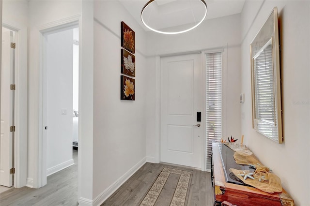 15865 Key Biscayne Ln, Loxahatchee, FL 33470 - entryway featuring light wood-style floors and baseboards