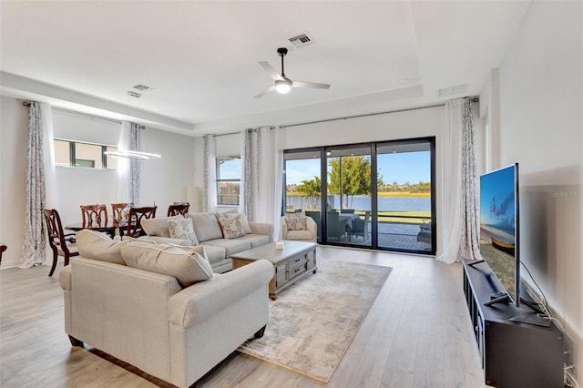15865 Key Biscayne Ln, Loxahatchee, FL 33470 - living area with light wood-type flooring and a ceiling fan
