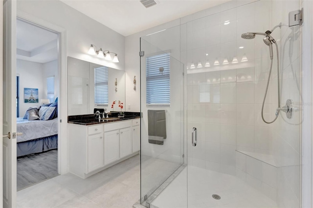 15865 Key Biscayne Ln, Loxahatchee, FL 33470 - bathroom with connected bathroom, a stall shower, tile patterned floors, and vanity