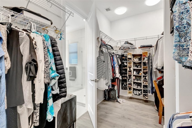 15865 Key Biscayne Ln, Loxahatchee, FL 33470 - spacious closet featuring wood finished floors