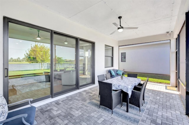 15865 Key Biscayne Ln, Loxahatchee, FL 33470 - sunroom with a ceiling fan and outdoor dining space