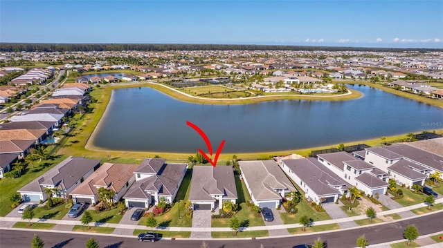 15865 Key Biscayne Ln, Loxahatchee, FL 33470 - aerial view of property's location with nearby suburban area and a nearby body of water