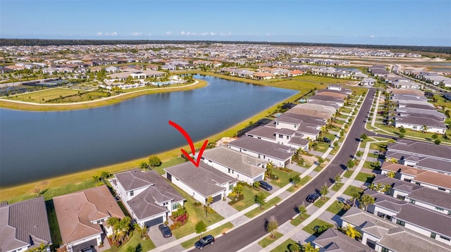 15865 Key Biscayne Ln, Loxahatchee, FL 33470 - aerial view of property and surrounding area with nearby suburban area and a large body of water