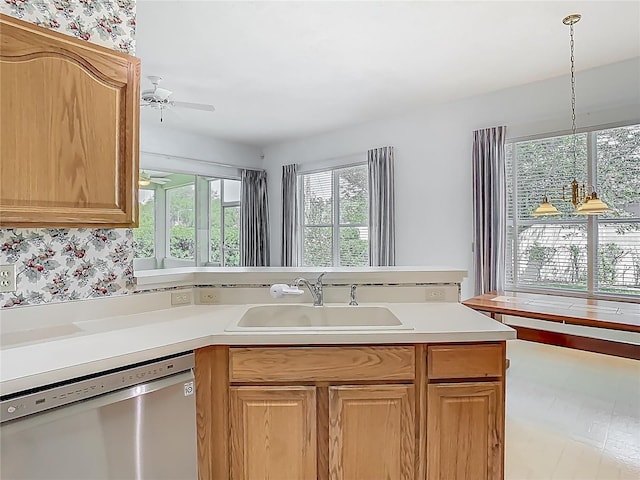 1157 Valley Creek Run, Winter Park, FL 32792 - kitchen with a ceiling fan, pendant lighting, stainless steel dishwasher, a sink, and light countertops