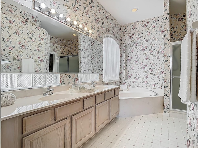 1157 Valley Creek Run, Winter Park, FL 32792 - full bathroom with double vanity, a bath, a shower stall, a sink, and wallpapered walls