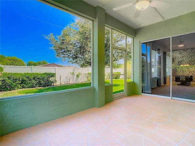 1157 Valley Creek Run, Winter Park, FL 32792 - unfurnished sunroom featuring a ceiling fan