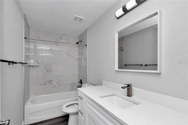 17468 SW 36th Ter, Ocala, FL 34473 - bathroom featuring toilet, vanity, bathtub / shower combination, and visible vents