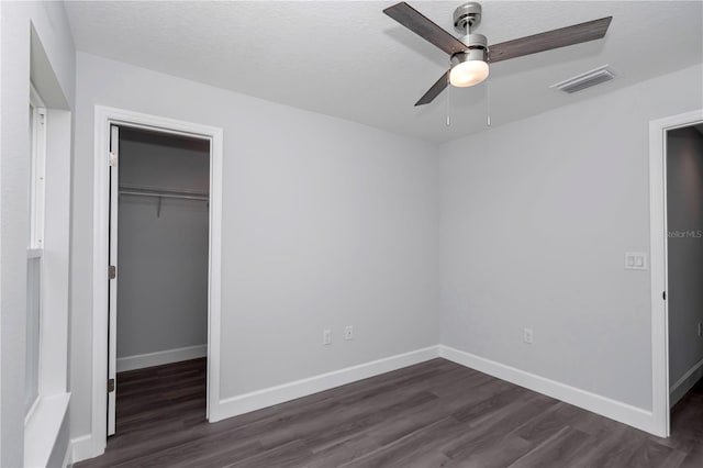 17468 SW 36th Ter, Ocala, FL 34473 - unfurnished bedroom with visible vents, a closet, baseboards, and dark wood finished floors