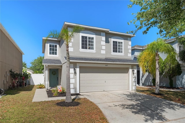 1415 Sherbourne St, Winter Garden, FL 34787 - traditional-style house featuring an attached garage, concrete driveway, stucco siding, and fence