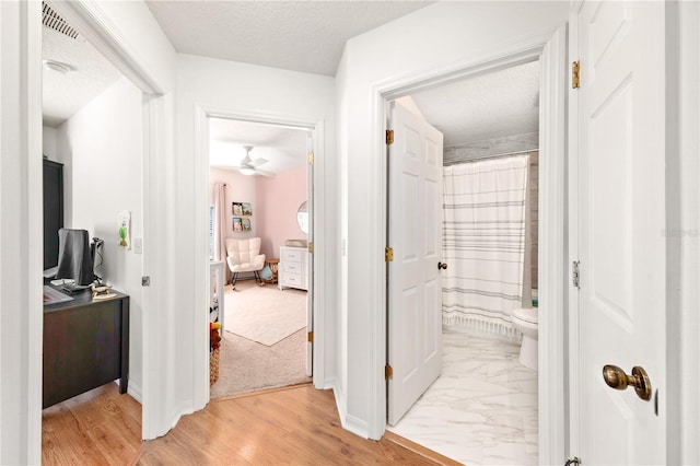 1415 Sherbourne St, Winter Garden, FL 34787 - corridor with visible vents and a textured ceiling