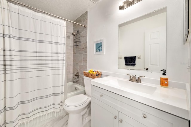 1415 Sherbourne St, Winter Garden, FL 34787 - full bathroom with toilet, a textured ceiling, vanity, and shower / tub combo