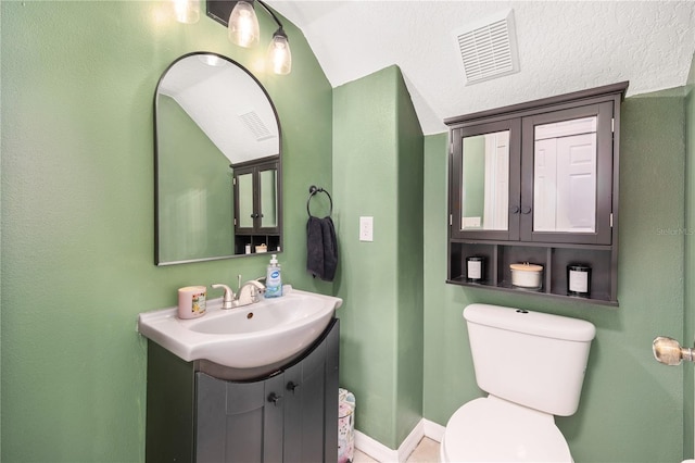1415 Sherbourne St, Winter Garden, FL 34787 - bathroom with visible vents, toilet, vanity, and baseboards