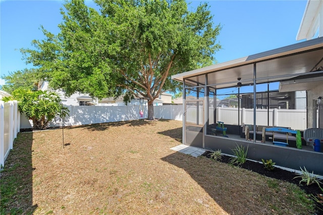 1415 Sherbourne St, Winter Garden, FL 34787 - view of yard with a sunroom and a fenced backyard