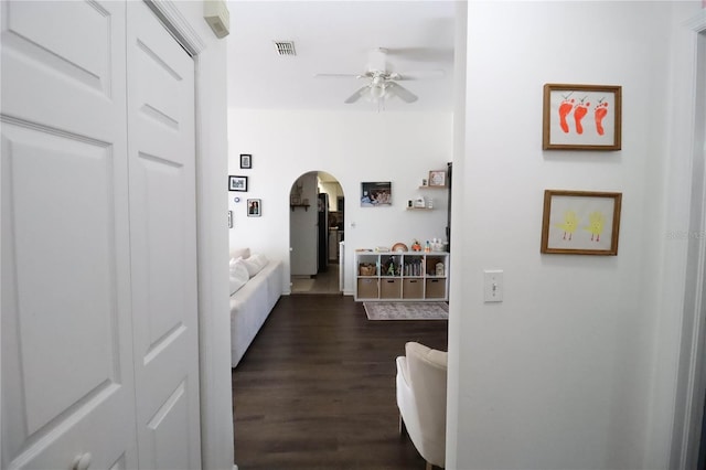 4217 Avanti Cir, New Port Richey, FL 34655 - corridor with arched walkways, dark wood-style floors, and visible vents