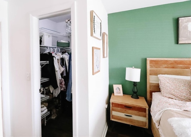 4217 Avanti Cir, New Port Richey, FL 34655 - bedroom with a walk in closet, a closet, and baseboards
