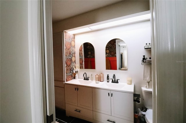 4217 Avanti Cir, New Port Richey, FL 34655 - bathroom featuring a sink, toilet, and double vanity