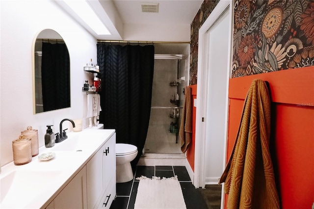 4217 Avanti Cir, New Port Richey, FL 34655 - bathroom with visible vents, toilet, tile patterned flooring, vanity, and a stall shower