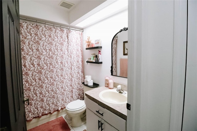 4217 Avanti Cir, New Port Richey, FL 34655 - bathroom featuring vanity, visible vents, and toilet