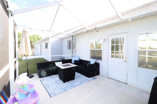 4217 Avanti Cir, New Port Richey, FL 34655 - view of patio / terrace featuring an outdoor living space with a fire pit