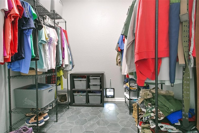 walk in closet featuring tile patterned floors