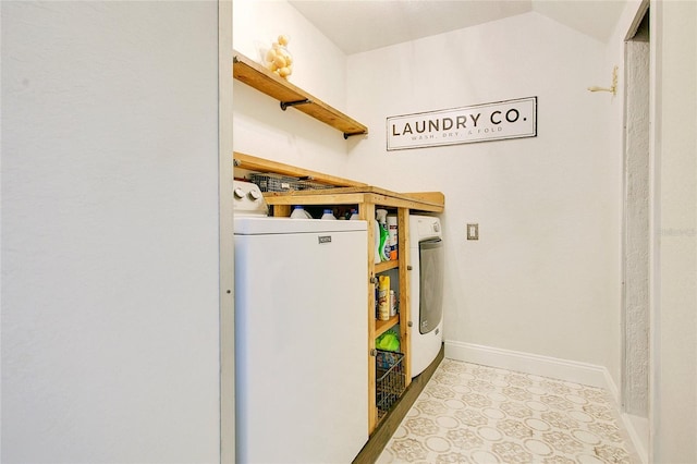 interior space with washer and clothes dryer