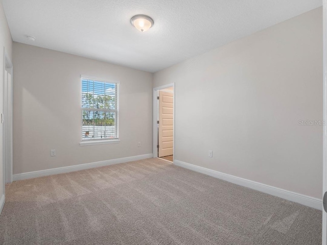 16195 Point Rock Dr, Winter Garden, FL 34787 - unfurnished room with light colored carpet and baseboards