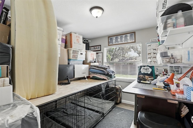 office space with wood finished floors