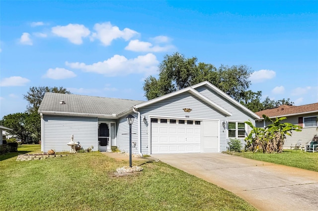 single story home featuring an attached garage, a front lawn, and concrete driveway