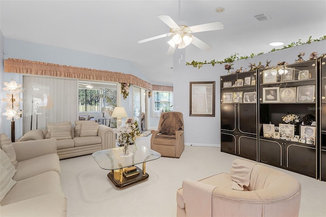 carpeted living room featuring visible vents, ceiling fan, baseboards, and lofted ceiling