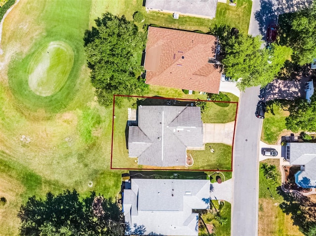 bird's eye view featuring view of golf course and a residential view