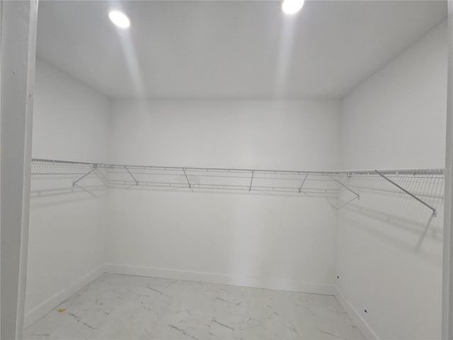 2310 Logsdon St, North Port, FL 34287 - spacious closet featuring light marble finish floors