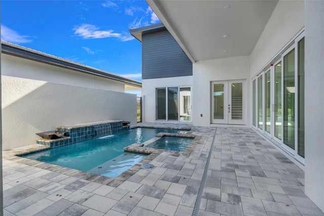 3024 Kensington Ave, Davenport, FL 33837 - outdoor pool with french doors, an in ground hot tub, and a patio
