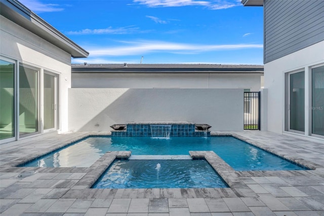 3024 Kensington Ave, Davenport, FL 33837 - view of pool featuring a pool with connected hot tub and a patio