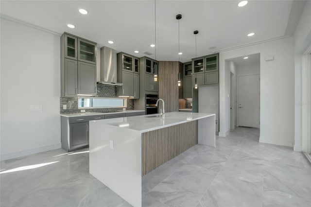 3024 Kensington Ave, Davenport, FL 33837 - kitchen with tasteful backsplash, a large island, wall chimney range hood, and recessed lighting
