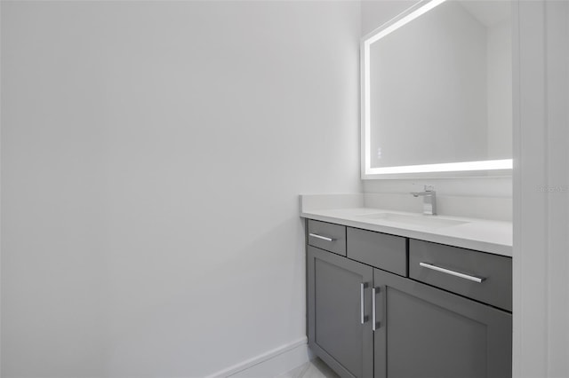 3024 Kensington Ave, Davenport, FL 33837 - bathroom featuring vanity and baseboards