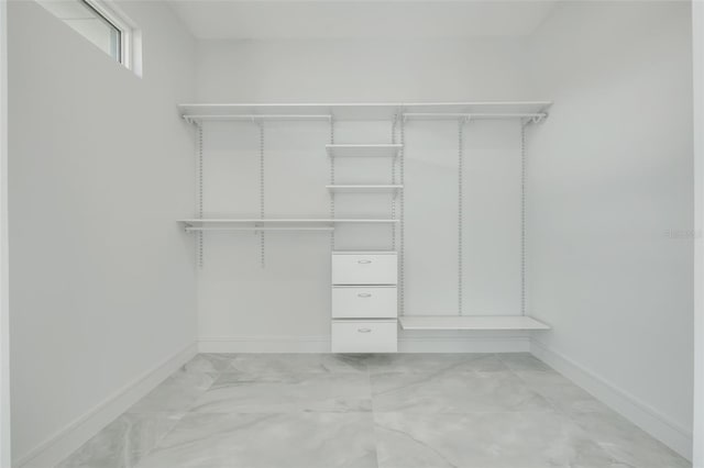 3024 Kensington Ave, Davenport, FL 33837 - walk in closet with marble finish floor