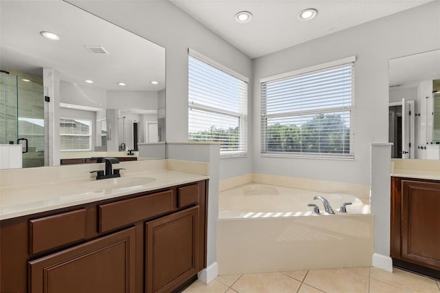 full bath with recessed lighting, visible vents, a shower stall, and a garden tub