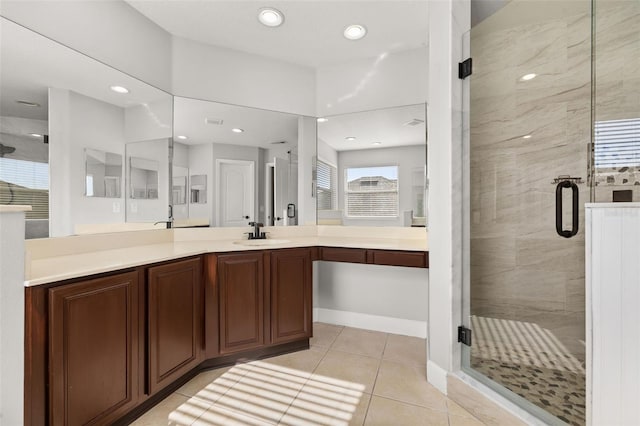 full bathroom featuring vanity, tile patterned flooring, a stall shower, and recessed lighting
