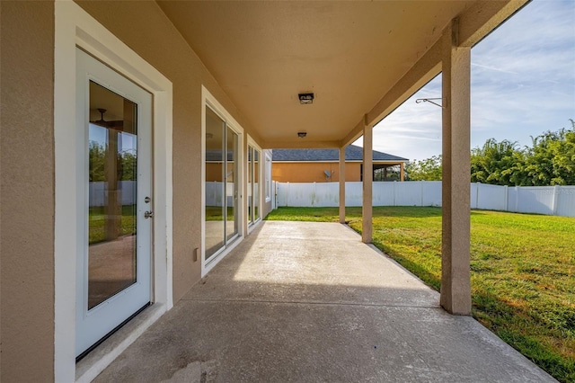 view of patio / terrace featuring fence