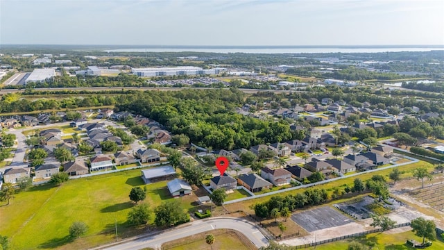 birds eye view of property with a residential view