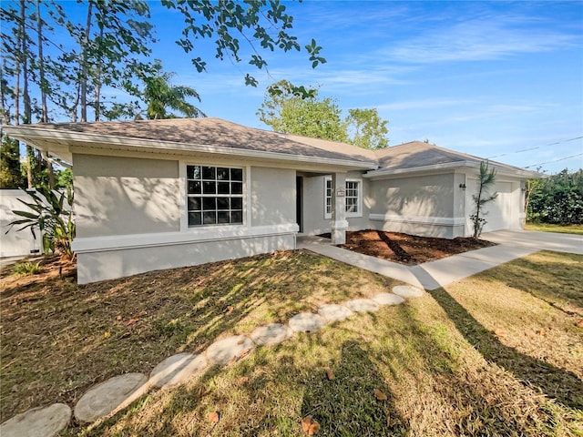 198 Bren Mar Ln, Palm Coast, FL 32137 - view of front facade featuring an attached garage, a shingled roof, driveway, and stucco siding