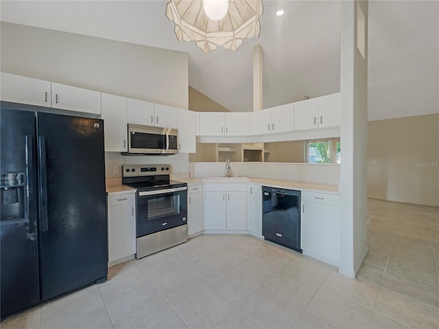 198 Bren Mar Ln, Palm Coast, FL 32137 - kitchen featuring a sink, light countertops, black appliances, and high vaulted ceiling