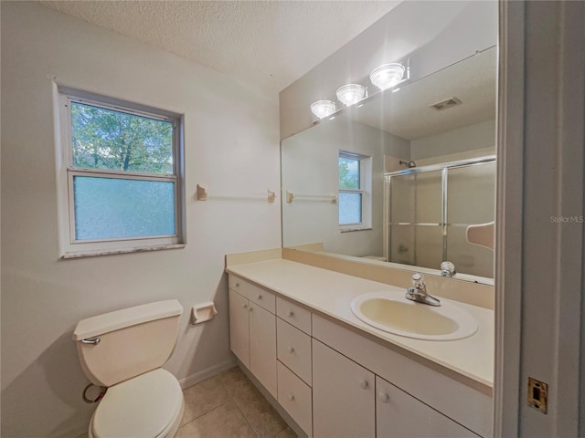 198 Bren Mar Ln, Palm Coast, FL 32137 - bathroom featuring a shower stall, vanity, plenty of natural light, and toilet