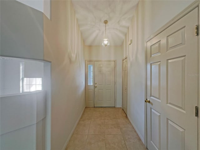 198 Bren Mar Ln, Palm Coast, FL 32137 - corridor with light tile patterned floors and baseboards