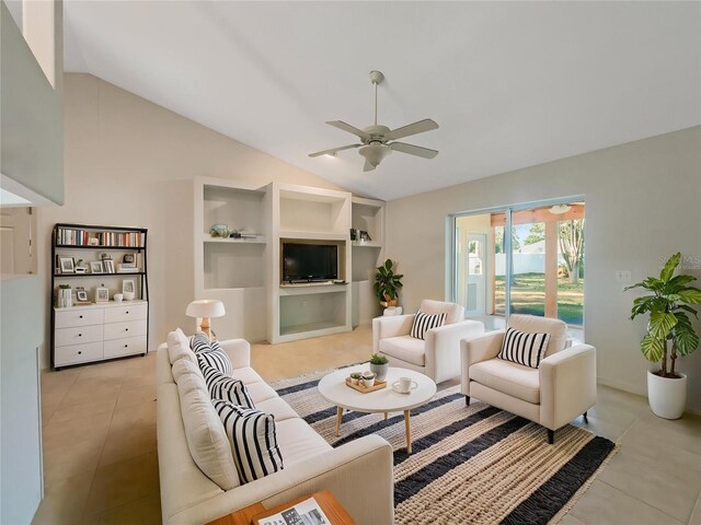 198 Bren Mar Ln, Palm Coast, FL 32137 - living room with light tile patterned floors, ceiling fan, and lofted ceiling