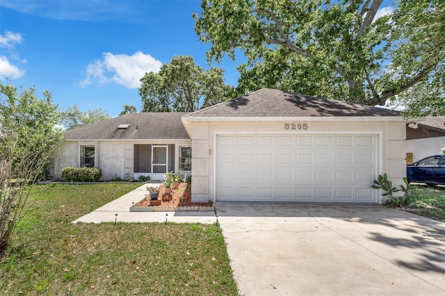 3205 Clewiston St, Deltona, FL 32738 - ranch-style house with a front yard, a shingled roof, an attached garage, concrete driveway, and stucco siding